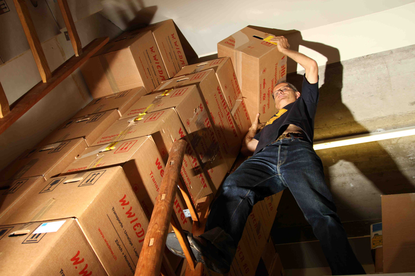 Ruedi with some boxes at the museum