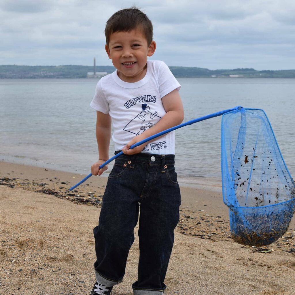 jack on the beach in Nippers outfit